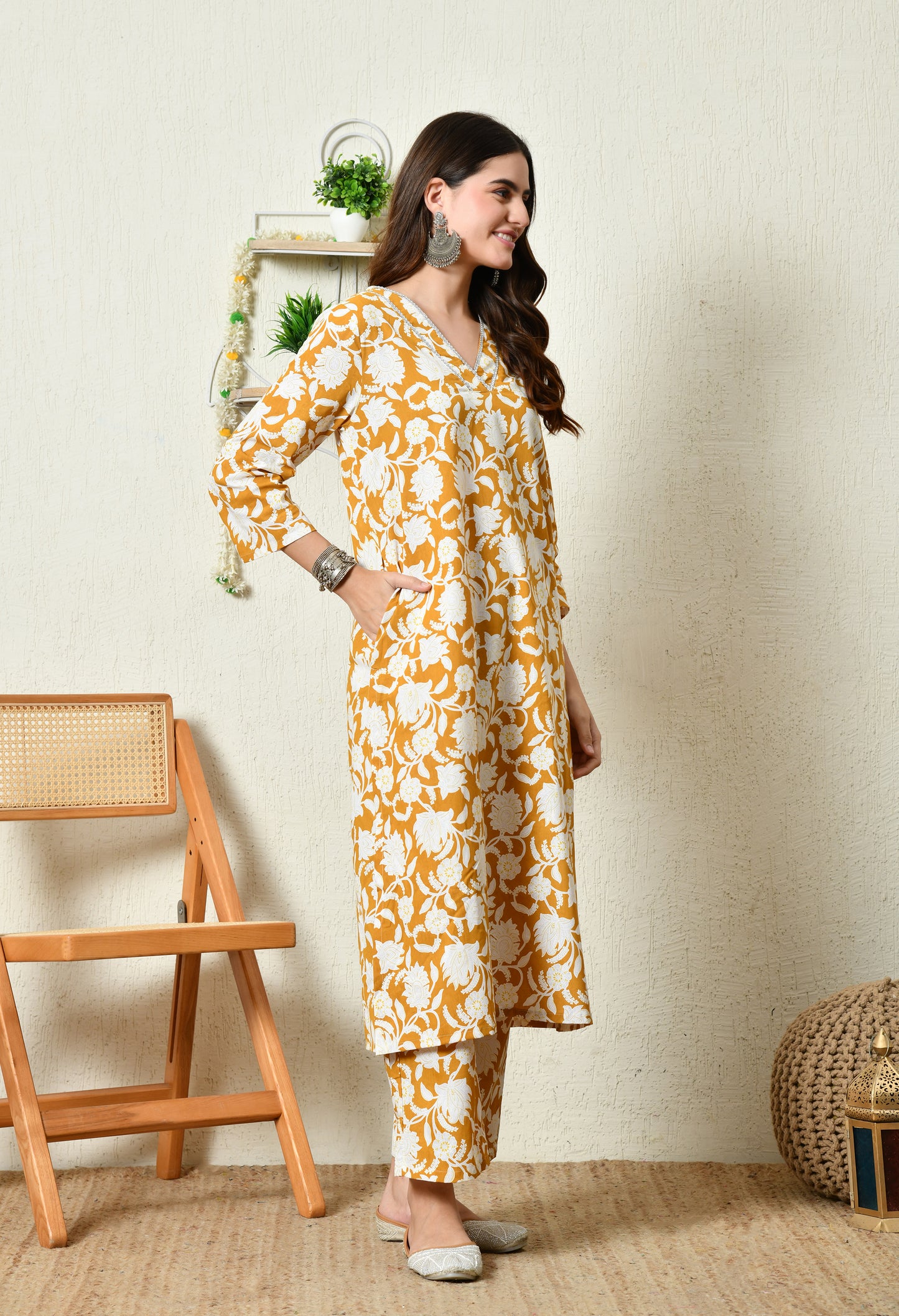 Mustard Floral Printed Rayon Kurta Set with Lace-Trim V-Slit Neckline & Side Pocket